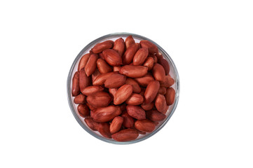 Peanuts in a glass bowl on a white background isolate. View from above.