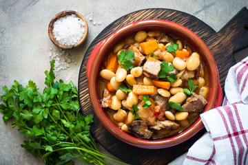 Beef stew with beans and vegetables. Top view.
