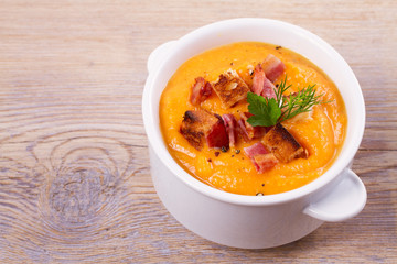 Butternut Squash and Bacon Soup in White Bowl, horizontal