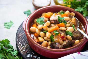 Beef stew with beans and vegetables.