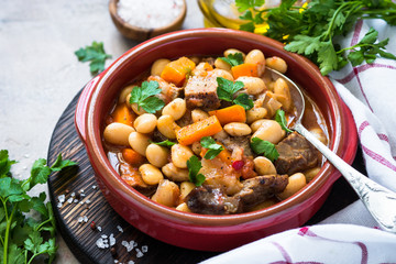 Beef stew with beans and vegetables.