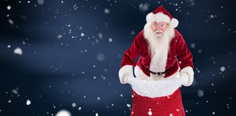 Composite image of santa open his red bag