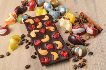 chocolate candies on a wooden table. handmade