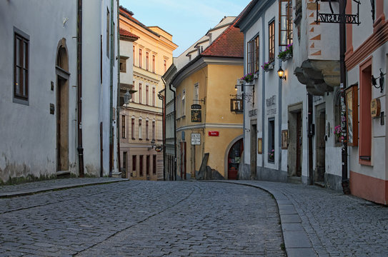 Fototapeta CESKY KRUMLOV, CZECH REPUBLIC - AUGUST 25, 2017: Morning view of a street of city center. Cesky Krumlov is a small city in the South Bohemian Region of the Czech Republic