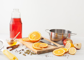Ingredients for mulled wine on a white table