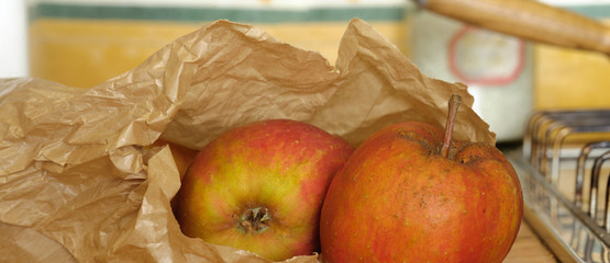 Cooking-appels coming out a brown bag for cooking