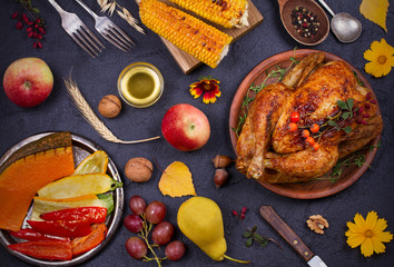 Chicken or turkey,  autumn food eating. Thanksgiving Day and Harvest food  background. Top view
