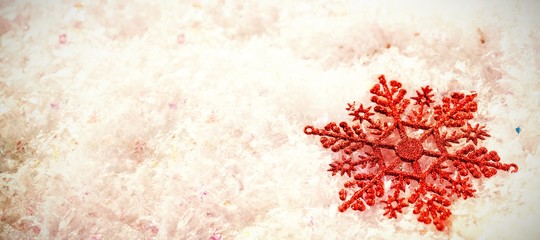 snowflake decoration on fake snow