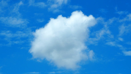 Big white cloud on the blue sky.