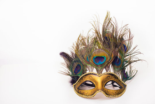 Venetian carnival mask with peacock feathers