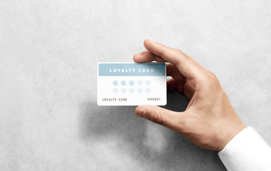 Hand hold discount card template with rounded corners. Plain reward namecard mock up holding arm. Plastic loyalty program mockup with points display. Gift offset card design. Loyal service branding.