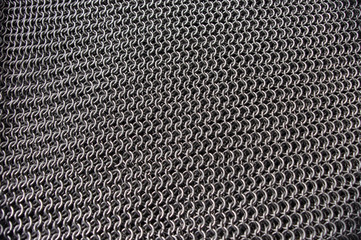 Metal chainmail ring pattern background
