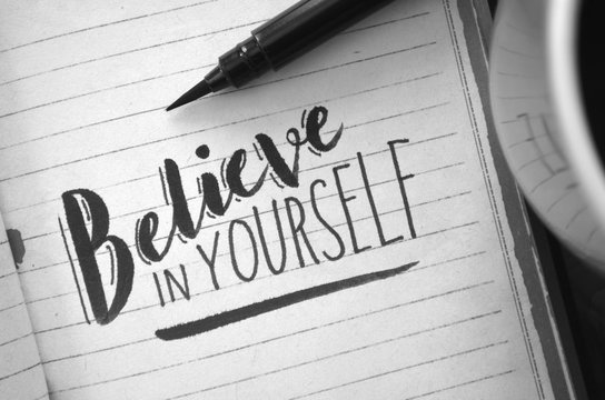 BELIEVE IN YOURSELF hand-lettered in notebook
