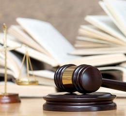 wooden gavel and books