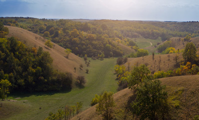 Fototapeta na wymiar Birdseye view of colorful hills in autumn