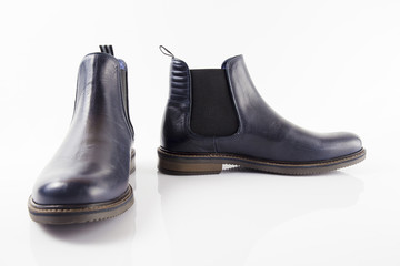 Male blue leather boot on white background, isolated product.