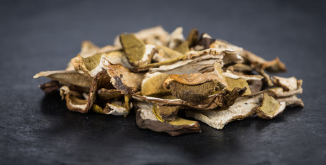 Dried Porcinis on a slate slab, selective focus