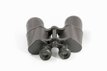 binoculars with large magnification on a monophonic background.