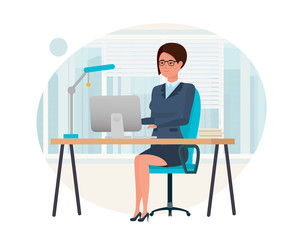 Girl, in strict clothes, working at computer in the office.