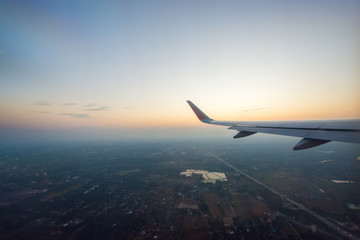 Fototapeta premium Sunrise sky from airplane window