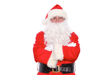 Kind Santa Claus standing with crossed arms, isolated on white background