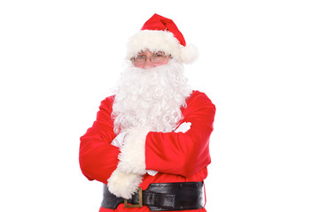 Kind Santa Claus standing with crossed arms, isolated on white background