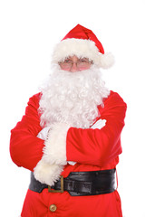 Kind Santa Claus standing with crossed arms, isolated on white background