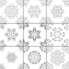 Gray and white floral ornaments. Collection of seamless patterns