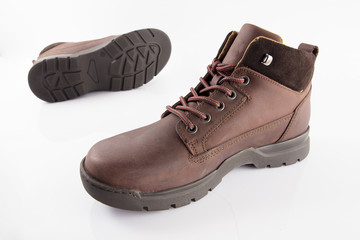 Male brown leather boot on white background, isolated product.