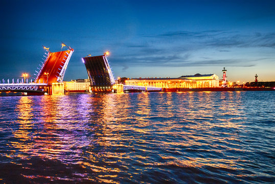 White night view on drawbridge big palace vasilievsky island Neva river Saint-Petersburg