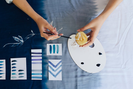 Female Artist Making Textile Print with Potato Stamps