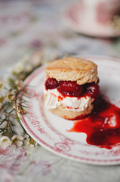 Scone with clotted cream and strawberry jam