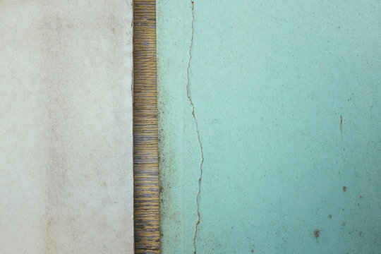 Pieces of discarded plywood and drywall
