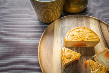 Mid-Autumn Festival moon cake on wooden plate
