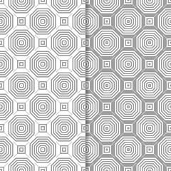 Gray and white geometric ornaments. Set of seamless patterns