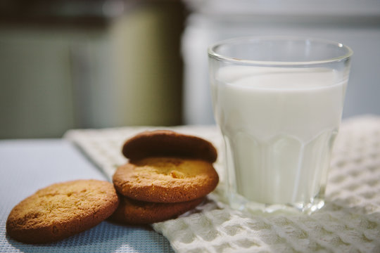 Glass of milk and cookies on the table, easy breakfast