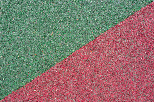 textured surface in red and green, diagonal pattern