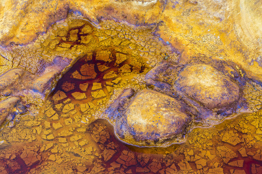 Aerial shot oxidised old mining iron minerals in water Rio Tinto