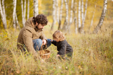 Father and child in the wild forest