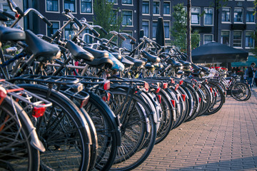 bikes parked in the center of amsterdam, netherlands