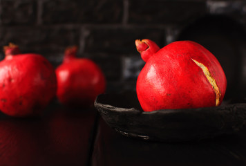  Still life with a pomegranate. Autumn fruits.