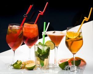 Cocktails on black and white background with mojito.