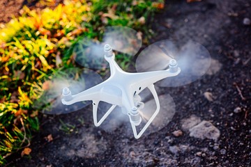 Starting white drone quadcopter