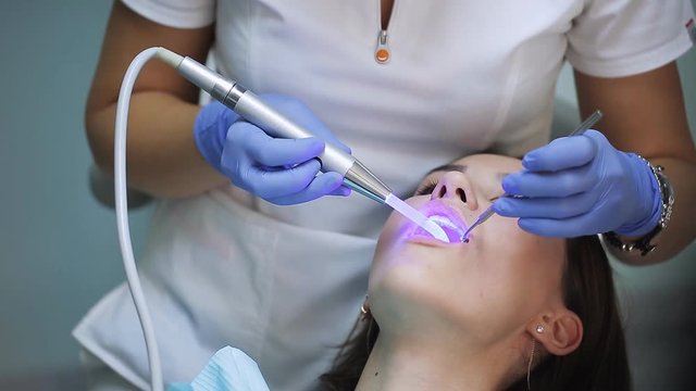 Dental restoration and material polymerization with UV light.