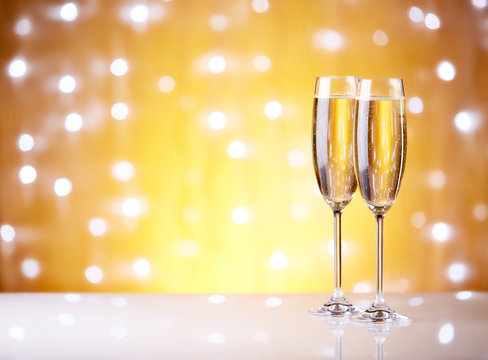 Champagne on a yellow background.