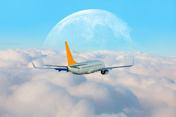 Passenger airplane in the clouds. travel by air transport 