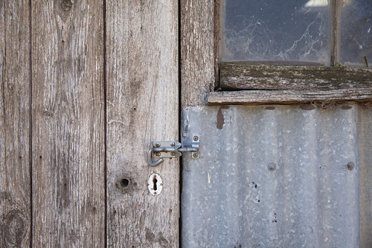 close up on old tin and wooden shed