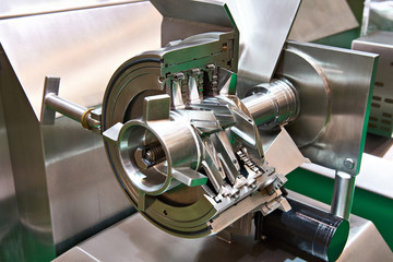 Industrial meat grinder in cut