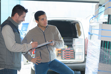 clerk recording the delivery