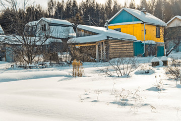 Garden village in a winter - country small settlement, The Urals, Russia